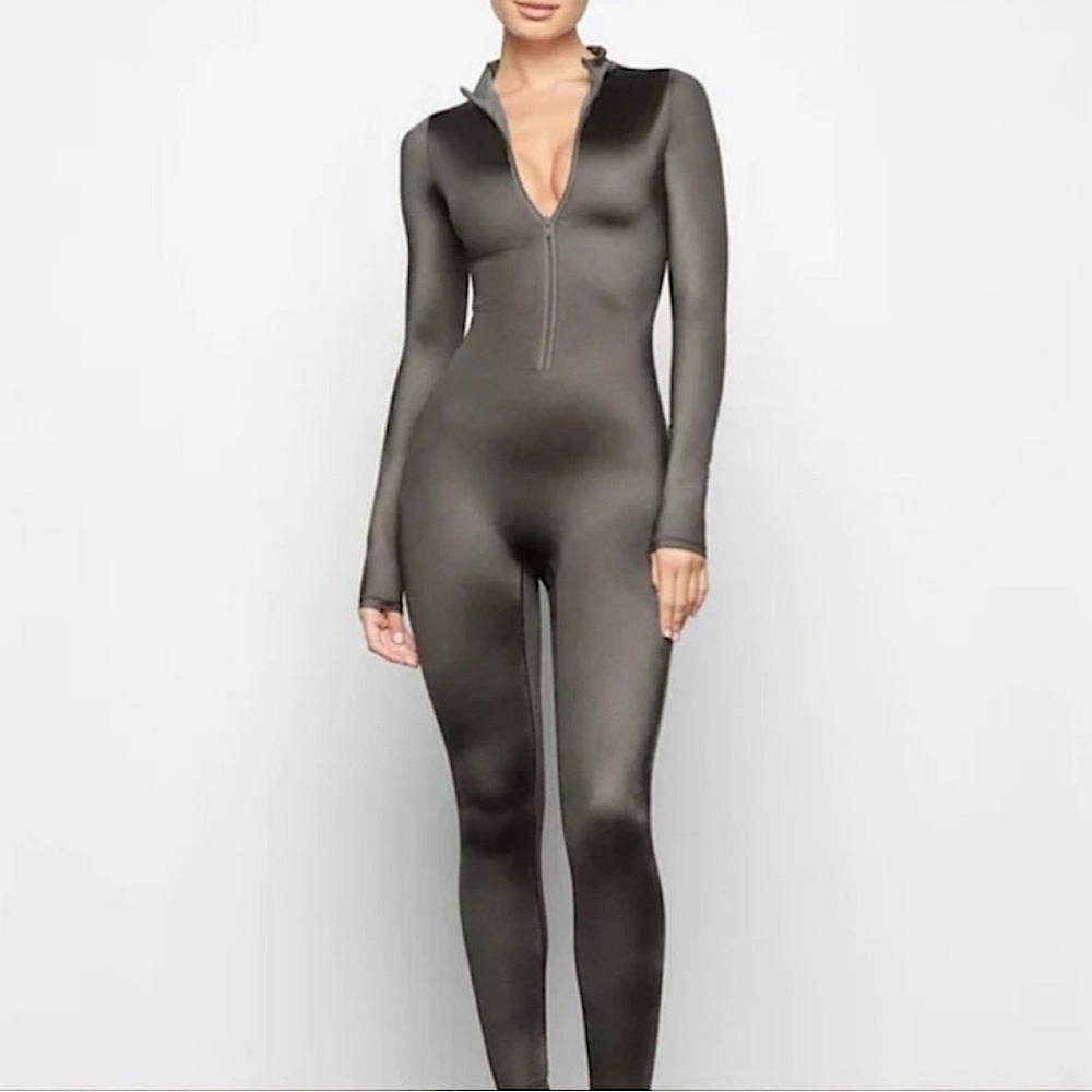 SKIMS ALL-IN-ONE SHINE MOCK NECK LONG SLEEVE ONESIE | GUNMETAL